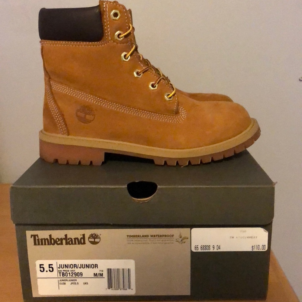 Size 5.5 kids wheat timberland. WORN ONCE.